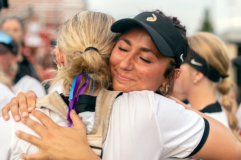 Lincoln-Way West players celebrate their win over Mundelein Saturday, June 6, 2026, in the class 4A state softball title game.