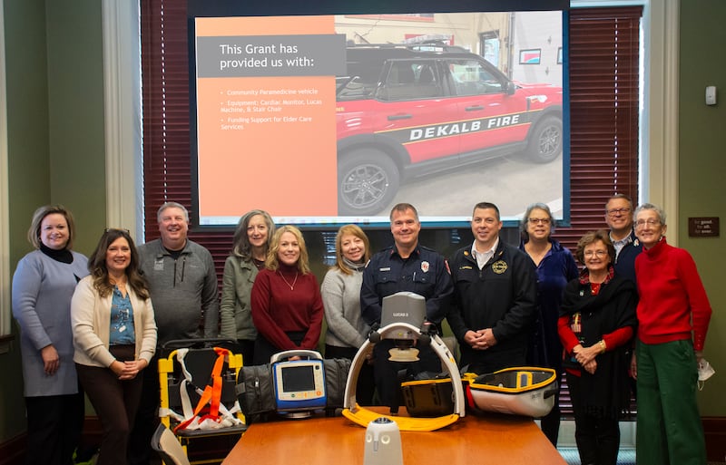 Representatives from the DeKalb Fire Department, Elder Care Services, and the DeKalb County Community Foundation gather in mid-December 2025 to highlight the Community Paramedicine Program grant, which supported the purchase of a new response vehicle and related equipment.