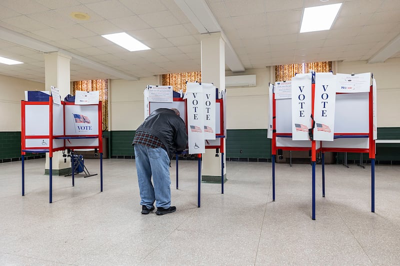 Ben Taylor of Dixon fills out his ballot Tuesday, March 17, 2026, at the Loveland House. Election judges saw slow voter turnout for this March primary.