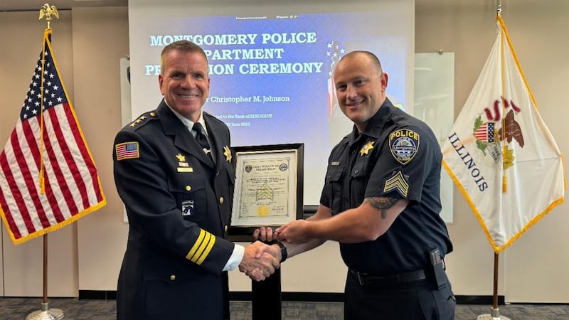 Montgomery Chief of Police Phil Smith (left) with Montgomery police Sgt. Chris Johnson.