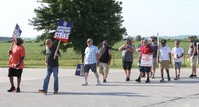 Workers with Republic Services and Teamsters Local 179 picket  in front of the west entrance to Republic Services on Wednesday, July 2, 2025 in Ottawa. The strike involves 25 employees at Republic Services at the Otawa facility. 
The action will disrupt waste collections for tens of thousands of residents throughout LaSalle County. Republic Teamsters are demanding a contract with improved wages, better benefits, and stronger labor protections. The Illinois strike comes after 450 Republic Teamsters in Boston went on strike on Tuesday. Hundreds of additional Teamsters across the country are having similar contract disputes with Republic.
