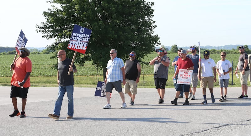 Workers with Republic Services and Teamsters Local 179 picket in front of the west entrance to Republic Services on Wednesday, July 2, 2025 in Ottawa. The strike involves 25 employees at Republic Services at the Otawa facility.
The action will disrupt waste collections for tens of thousands of residents throughout LaSalle County. Republic Teamsters are demanding a contract with improved wages, better benefits, and stronger labor protections. The Illinois strike comes after 450 Republic Teamsters in Boston went on strike on Tuesday. Hundreds of additional Teamsters across the country are having similar contract disputes with Republic.
