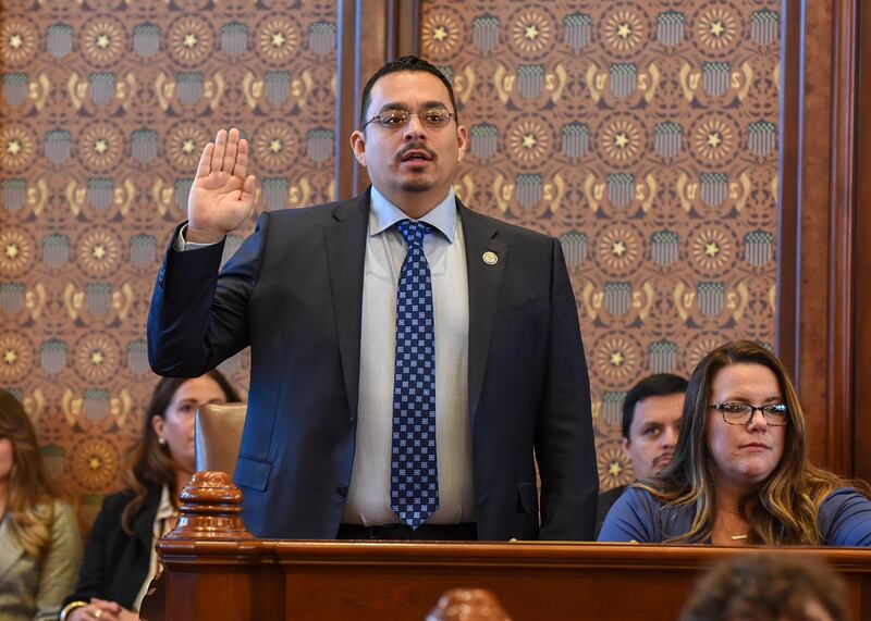 Li Arellano Jr. takes the oath of office as he is sworn into the Illinois Senate on Wednesday, Jan. 8, 2025, in Springfield.
