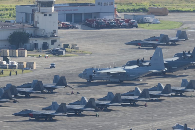 U.S. military aircraft are parked on the tarmac at Jose Aponte de la Torre Airport in Ceiba, Puerto Rico, Saturday, Jan. 3, 2025. (AP Photo/Alejandro Granadillo)