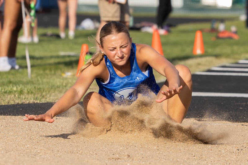 Princeton’s Ashlynn Weber lands her long jump Wednesday, May 14, 2025, during Sectionals at Rock Falls High School.