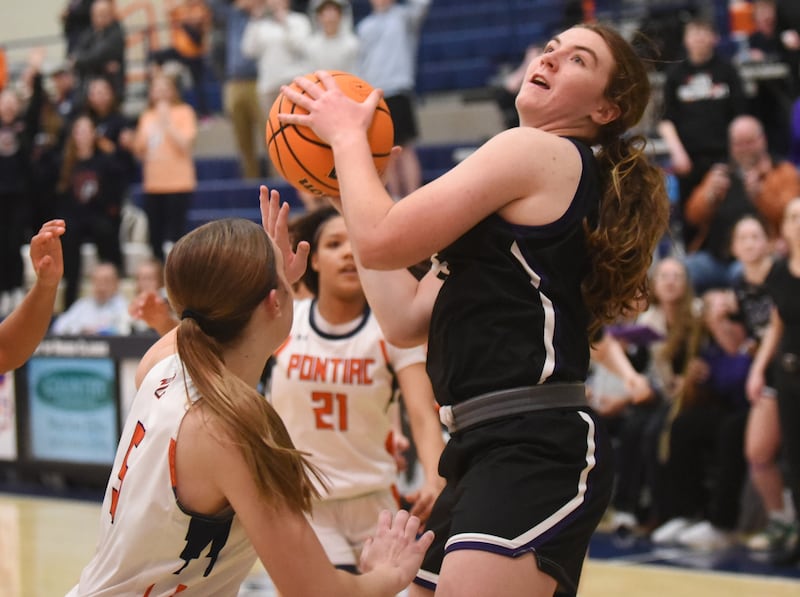 Manteno's Emily Horath attempts to beat the buzzer with a potential game-tying shot during the IHSA Class 2A Pontiac Sectional championship against Pontiac Thursday, Feb. 26, 2026.