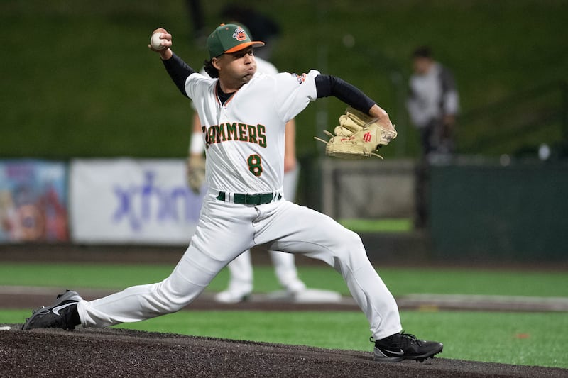 Hall graduate Ty Rybarczyk delivers a pitch during a game with the Joliet Slammers this season.
