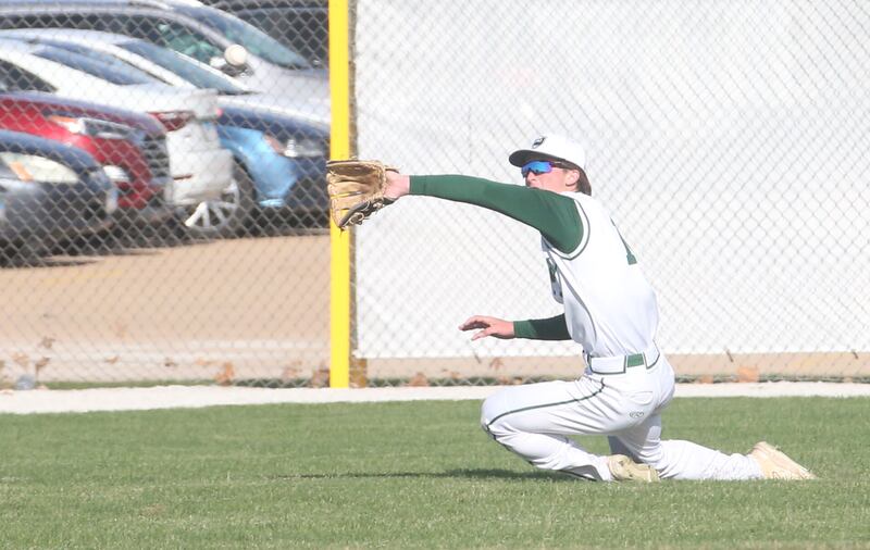 St. Bede left-fielder AJ Hermes dives to make a running catch against Hall on Monday, March 31, 2025 at Schweickert Stadium in Peru.