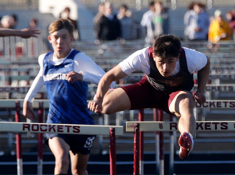 Prairie Ridge's Alexander Trejo flies over a hurdle on his way to winning the 110 meter high hurdles during the IHSA Class 2A Richmond-Burton Sectional Boys Track and Field Meet on Wednesday, May 20, 2026, at Richmond-Burton High School.