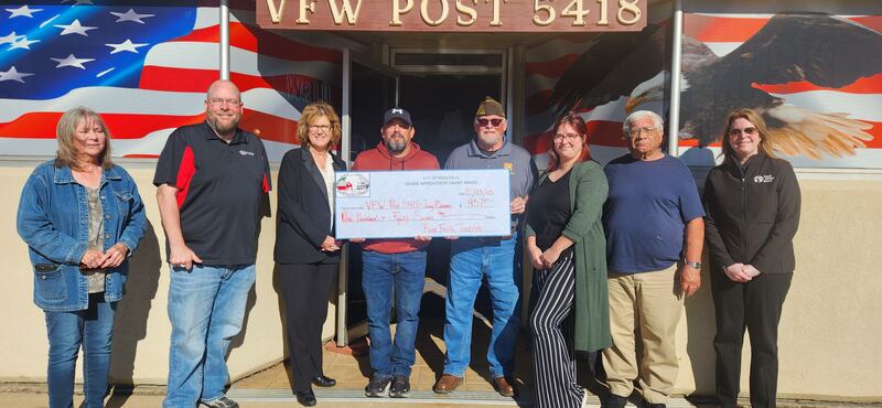 Pictured (left to right): Vicki Byrd, Nathan Stahr, Melinda Jones, Ryan Arduinni, Jim Wise, Amber Martinez, Mayor Rodney Kleckler, and Christina Wolfe on the day the Rock Falls VFW Post 5418 – Jerry Celletti received a grant through the Rock Falls Façade Improvement Program.