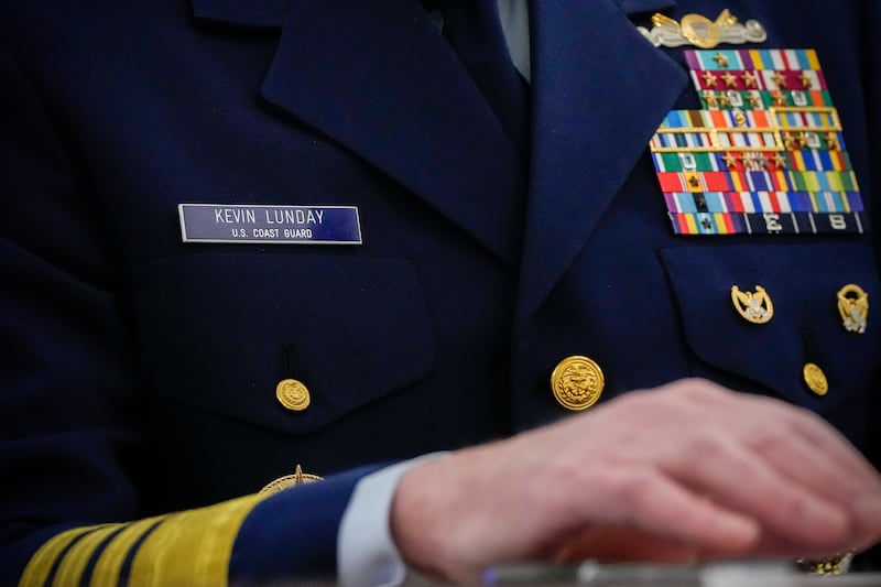 The name tag and ribbons of Adm. Kevin Lunday, acting commandant of the U.S. Coast Guard, are visible as he speaks during a Senate Commerce, Science and Transportation Committee hearing on his nomination for Commandant of the Coast Guard, Wednesday, Nov. 19, 2025, on Capitol Hill in Washington. (AP Photo/Julia Demaree Nikhinson)
