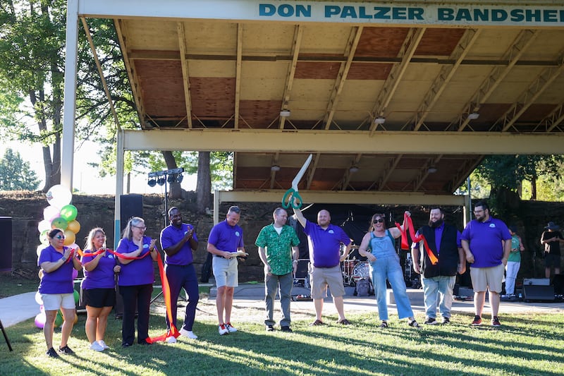 Members of the Kankakee Valley Park District board and staff celebrate as they cut the ribbon at Bird Park on Aug. 20, 2025, following the $1.2 million improvement project to the Kankakee park.