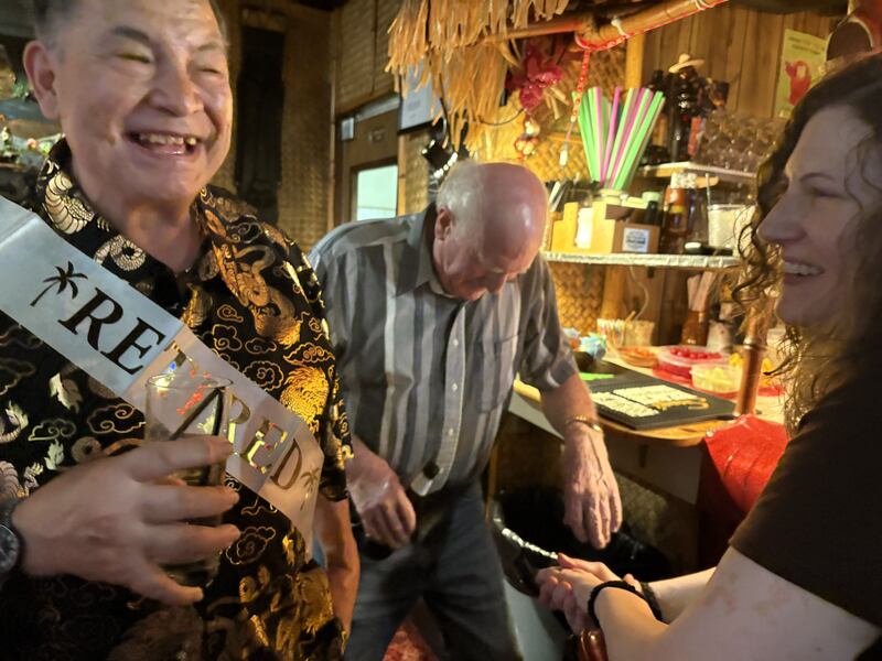 Danny Kakazu, left, talks with Kira Stell and Bob Halvey during his retirement party at the Breakers in Crystal Lake June 29, 2025.