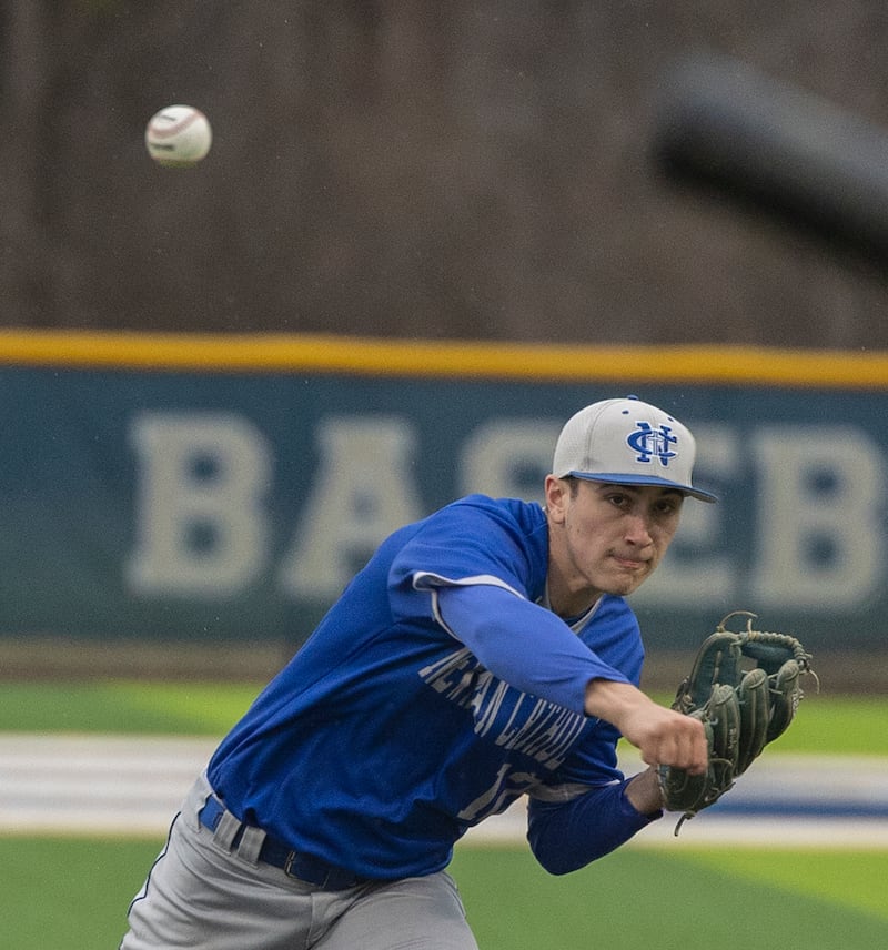 Newman’s Evan Bushman fires a pitch against Sterling Thursday, March 26, 2026.