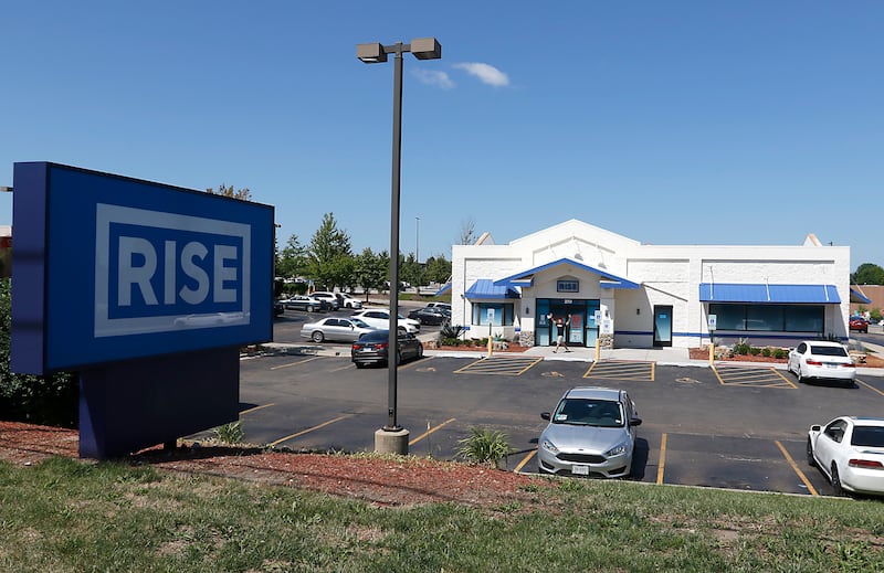 A person leaves RISE, 270 North Randall Road in Lake in the Hills on Thursday, July 14, 2022. Marijuana is set to grow both across the state and in McHenry County. Currently, RISE in Lake in the Hills is the lone dispensary open in the county.