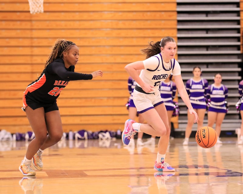 DeKalb's Zora Watts pursues a Rochelle ball handler in the Barbs' 46-31 road win on Monday, Dec. 1, 2025.