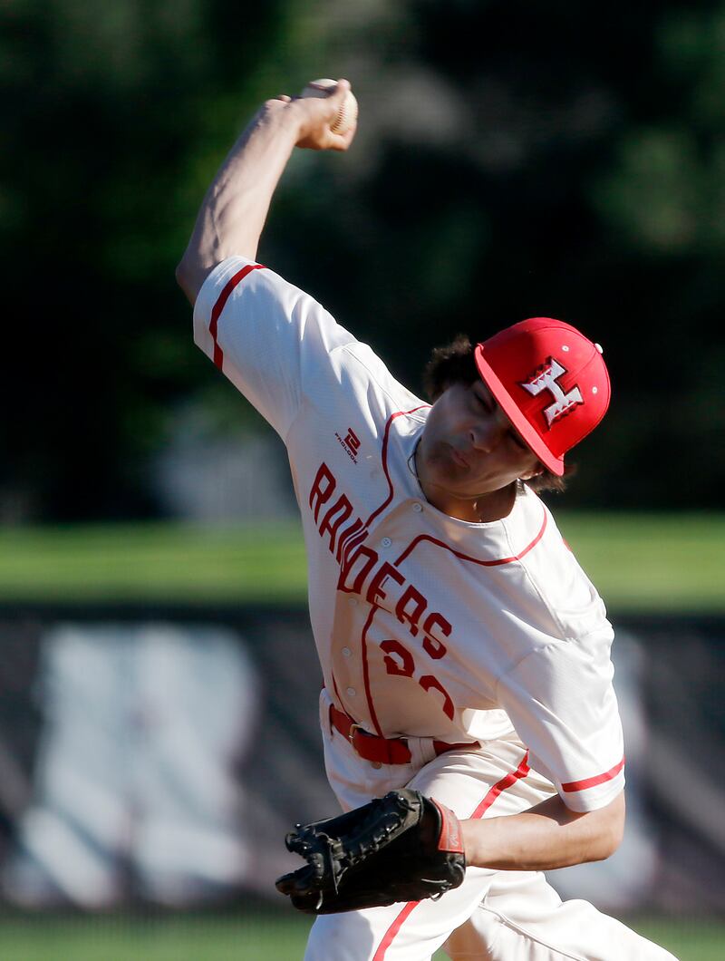 Huntley's Sean Dabe pitches during a Fox Valley Conference baseball game against Dundee-Crown on Friday, May 9, 2025, at Huntley High School.