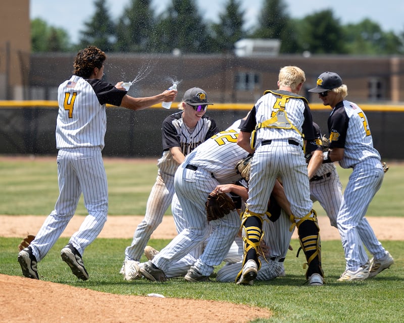 Putnam County Baseball players celebrate sectional championship win against Fulton on June 6, 2026 at Putnam County High School in Granville.