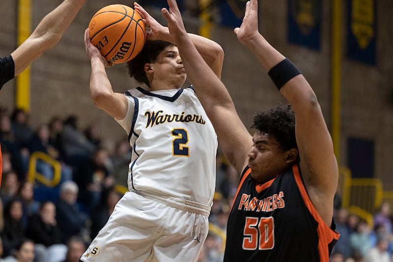 Sterling’s Deandre Maas goes to the hoop against UT’s Octavius Hickman Friday, Jan. 16, 2026.