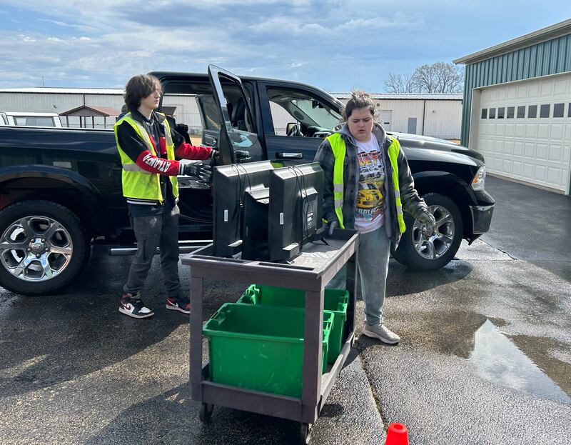 Volunteers unload electronics during one of the Ogle County Solid Waste Department's recycling events in Oregon. The next electronic recycling event is Friday, June 27, in Oregon.
