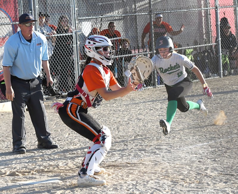 Rock Falls' Zoey Silva begins her slide to give ther Rockets their first run against Winnebago at the 2A Oregon Regional semifinal on Wednesday, May 20, 2026 at Oregon Park West.