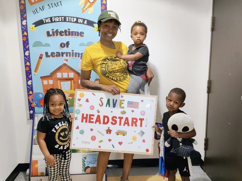 Aaliya Johnson is pictured with her three children in support of Will County's Head Start program. Johnson's son DioVanni Wilson (right, holding a toy) participates in the program.