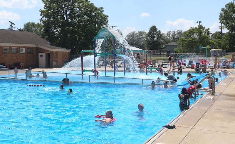 Children cool off in the water on Monday, June 17, 2024 at the Riordan Pool in Ottawa.