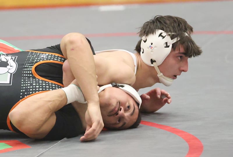 L-P's Jentz Watson wrestles Kaneland's Josh Karther during a meet on Thursday, Jan. 22, 2026 in Sellett Gymnasium at L-P High School.
