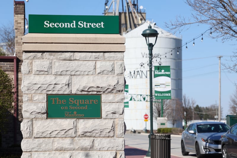 A village street sign directs visitors to The Square on Second in the downtown Manteno.