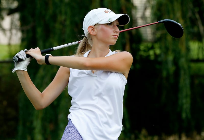Rylee Rud watches her tee shot on the sixth hole during the final round of McHenry County Junior Amateur Golf Tournament on Tuesday, July 18, 2025, at Foxford Hills Golf Club in Cary.