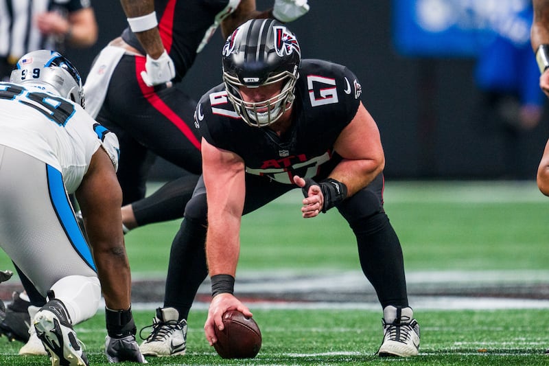 Atlanta Falcons center Drew Dalman (67) lines up during the first half of an NFL football game against the Carolina Panthers, Sunday, Jan. 5, 2025, in Atlanta. The Panthers defeated the Falcons 44-38. (AP Photo/Danny Karnik)