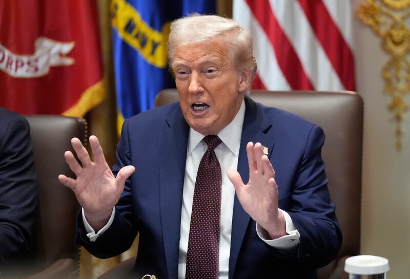 President Donald Trump speaks during a cabinet meeting, Tuesday, Aug. 26, 2025, at the White House in Washington. (AP Photo/Mark Schiefelbein)