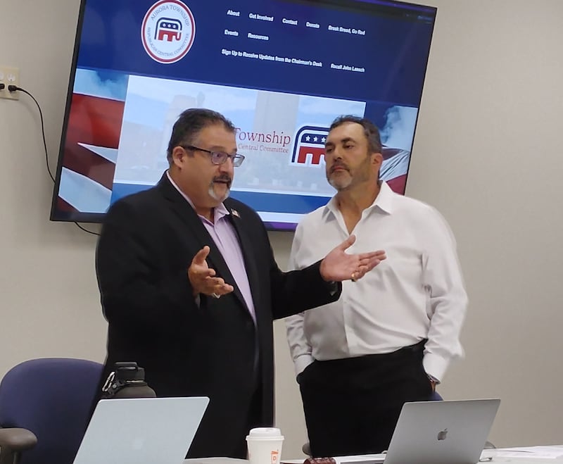 Aurora Township GOP Chairman Danny Souri (left) and Kane County GOP Chairman Andro Lerario discuss challenges to the local Republican Party at a meeting Wednesday, Oct. 1 in St. Charles.