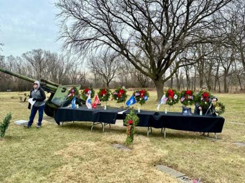 Wreaths Across America volunteers hold a service before laying wreaths on the graves at Woodlawn Cemetery. 
December 2024.