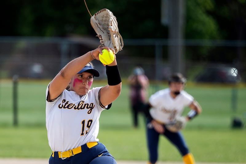 Sterling’s Lily Martinez winds up for a pitch against Rochelle during a Class 3A Regional softball game in Dixon.