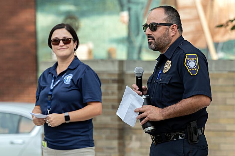 Sterling mayor Diana Merdian and police chief Alejandro Chavira say a few words Tuesday, August 1, 2023 at the department’s National Night Out celebration.