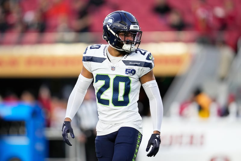 Seattle Seahawks safety Julian Love warms up before an NFL football game against the San Francisco 49ers in Santa Clara, Calif., Saturday, Jan. 3, 2026. (AP Photo/Godofredo A. Vásquez)