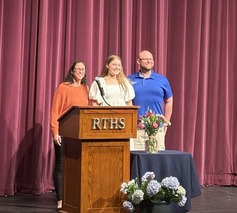 Rochelle Township High School Health & Wellness Scholarship recipient Mary Chadwick (center) receives the scholarship from Northern Rehab’s Janet Truckenbrod Sarver (left) and Marshall Basler (right).