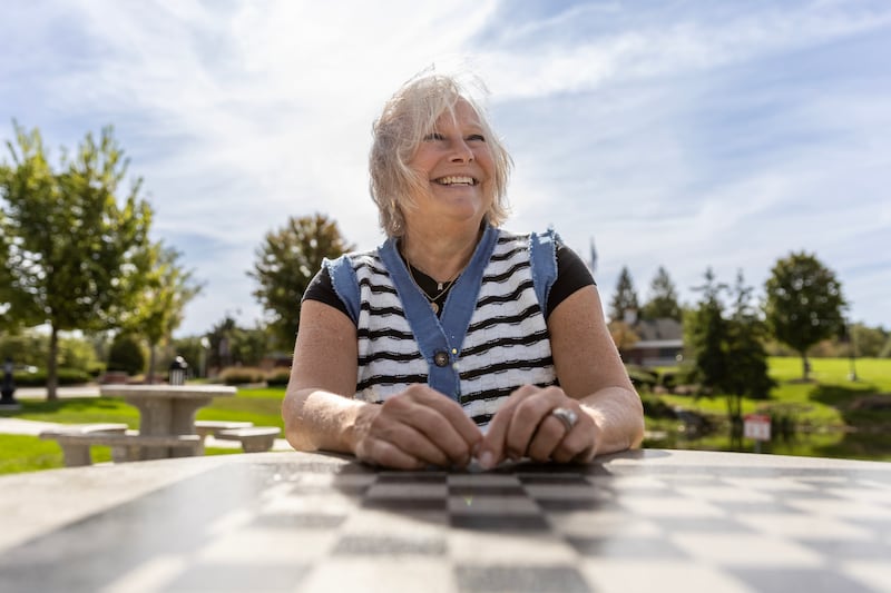 Julie Bay enjoys spending time, contemplating gratitude, and experiencing joy, at the New Lenox Commons, as pictured on Oct. 1, 2025.