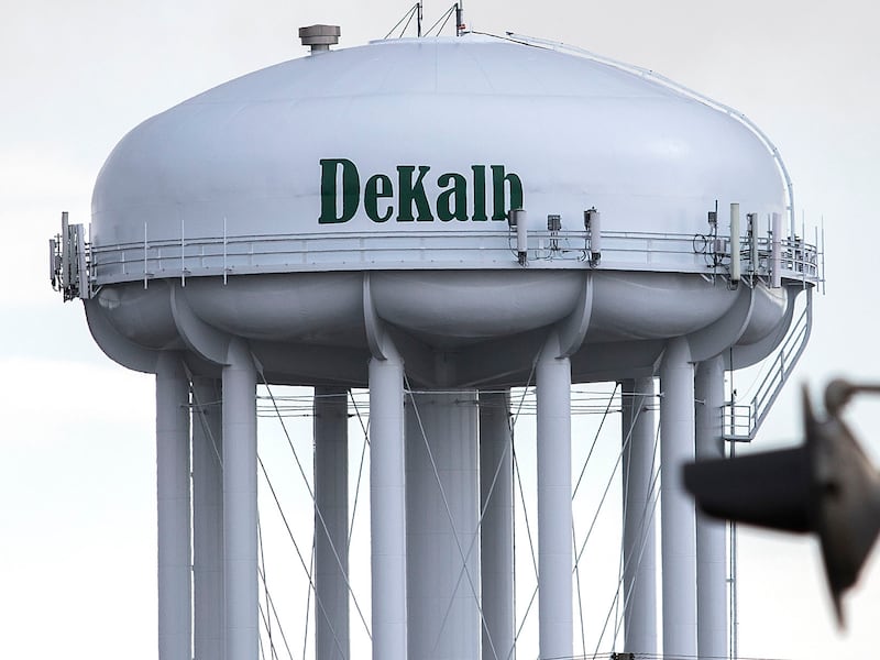 A DeKalb water tower stands in the distance on Thursday, March 2, 2017, in DeKalb.