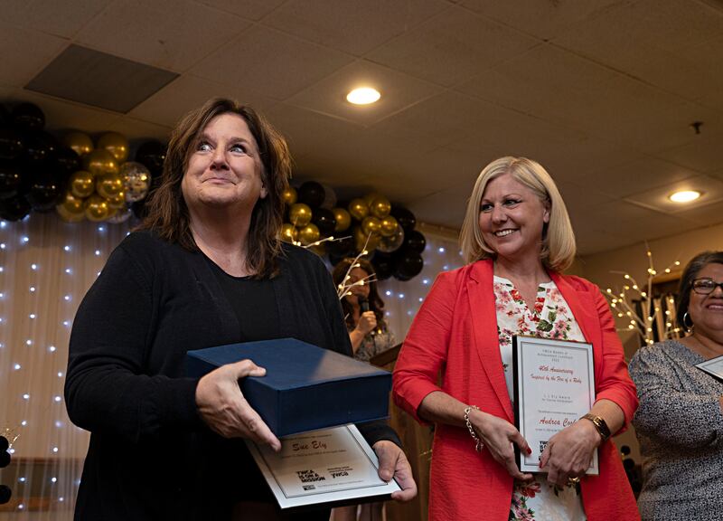 The L.L. Ely Award for Clerical Excellence goes to Sue Ely (left) Thursday, April 13, 2023 at the YWCA Women of Achievement Luncheon.