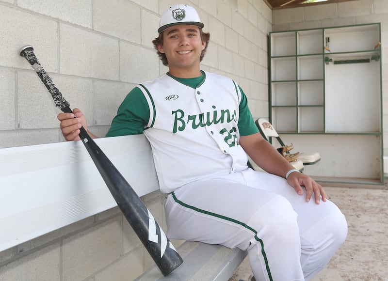 St. Bede's Alan Spencer poses in the dugout for a photo on Thursday, June 5, 2025 at St. Bede academy.