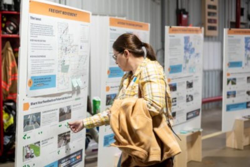 A resident views display boards at a November open house in Manhattan for the Will County "Our Way Forward" transportation plan. June 6, 2025