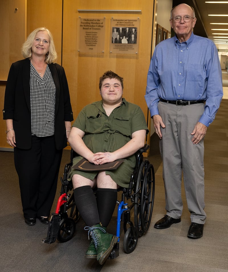 Kishwaukee College president Laurie Borowicz, Woodfin Billingsly and Kishwaukee College board of trustees chair Bob Johnson