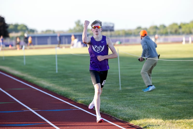 Dixon’s Averick Wiseman celebrates a run away win in the 1600 Wednesday, May 20, 2026, at the Rochelle Class 2A boys track sectionals.