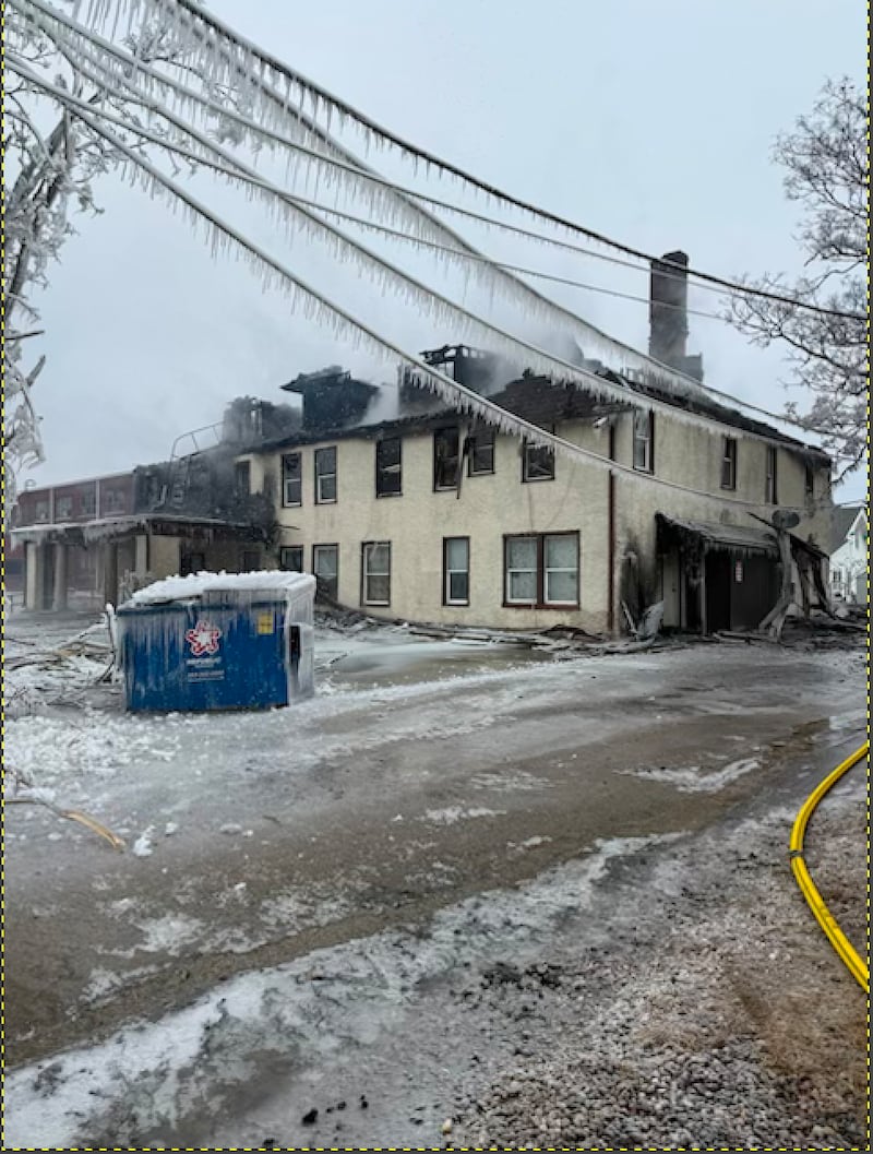 Firefighters battled a blaze Sunday at 201 11th Ave., Fulton, in wind chills as low as 14 degrees below zero.