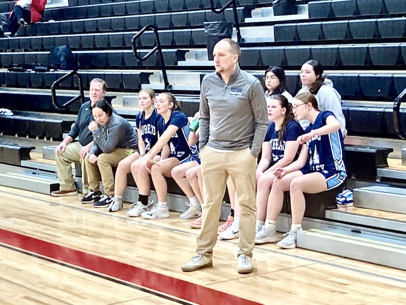 Bureau Valley coach Jon Henegar watches the play on the court at Prophetstown Tuesday night. The Storm defeated Stockton 51-27 the Warkins Tournament at 3-1.