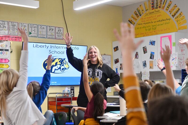Fourth-grade science teacher Ashley Birkey asks questions of her students Wednesday, Nov. 13, 2024, at Liberty Intermediate School. The school recently achieved exemplary status on the Illinois State Board of Education’s annual Illinois Report Card gradings.