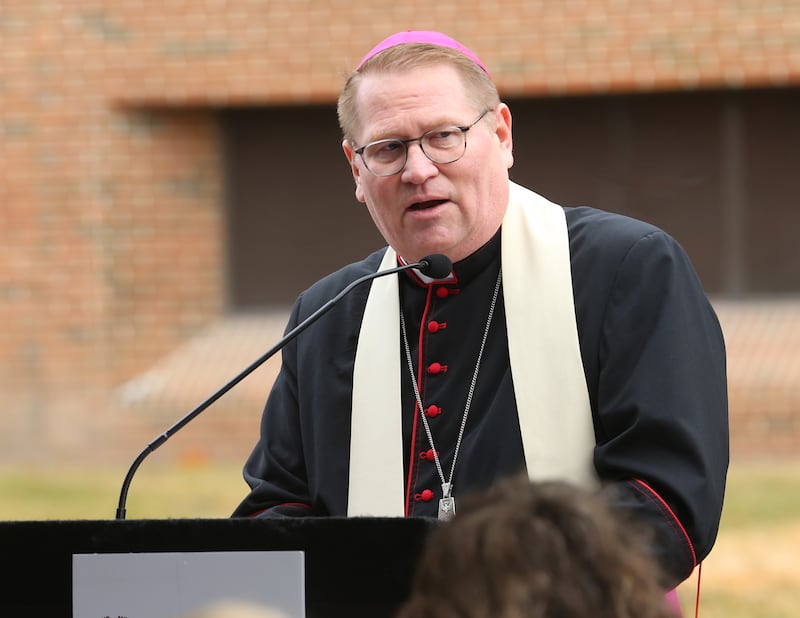 Bishop Louis Tylka of the Catholic Diocese of Peoria blesses the outpatient entrance on Thursday, Oct. 31, 2024 at OSF HealthCare Saint Elizabeth Medical Center in Peru.