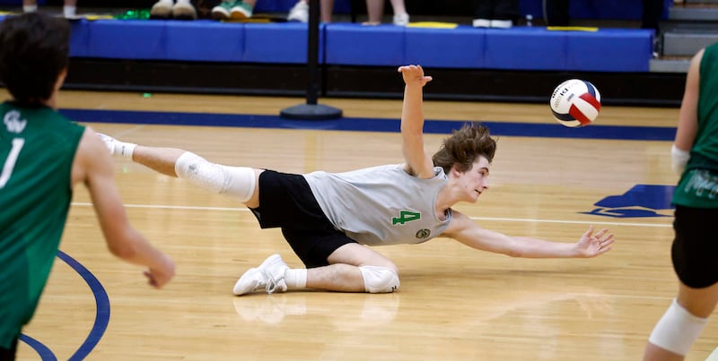 Glenbard West's Brendan Markey (4) tries to make a diving save during the championship match of the IHSA State Final Boys Volleyball Tournament Saturday, June 7, 2025 in Hoffman Estates.